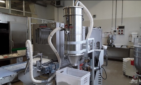 Transportadores neumáticos para manipular polvos alimenticios